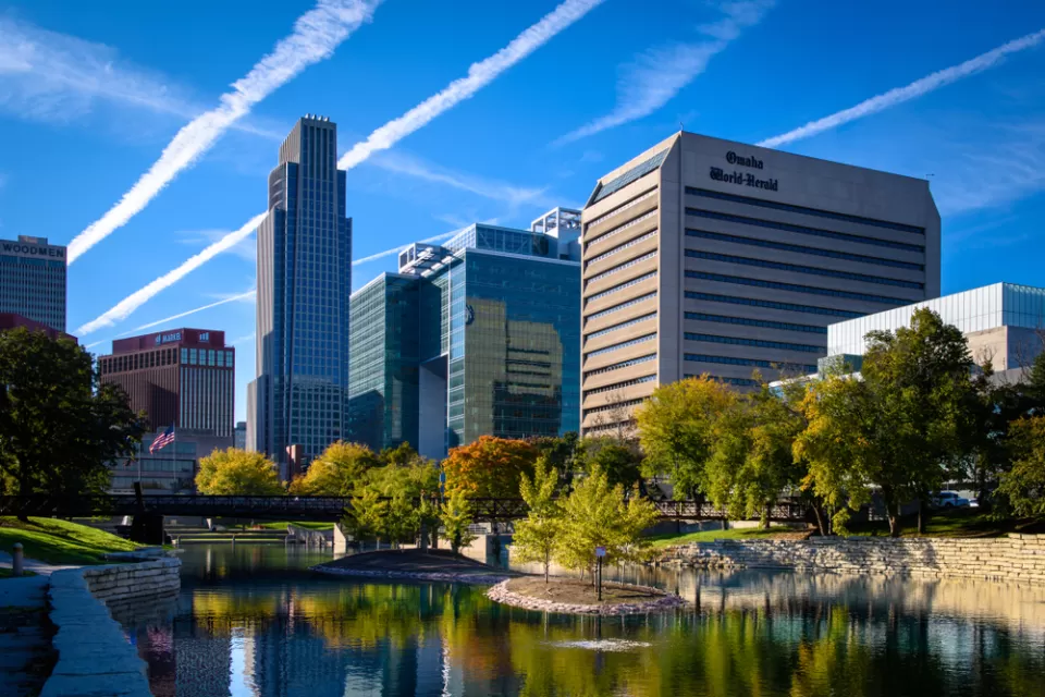 View of Omaha, nebraska skyline with river in foreground